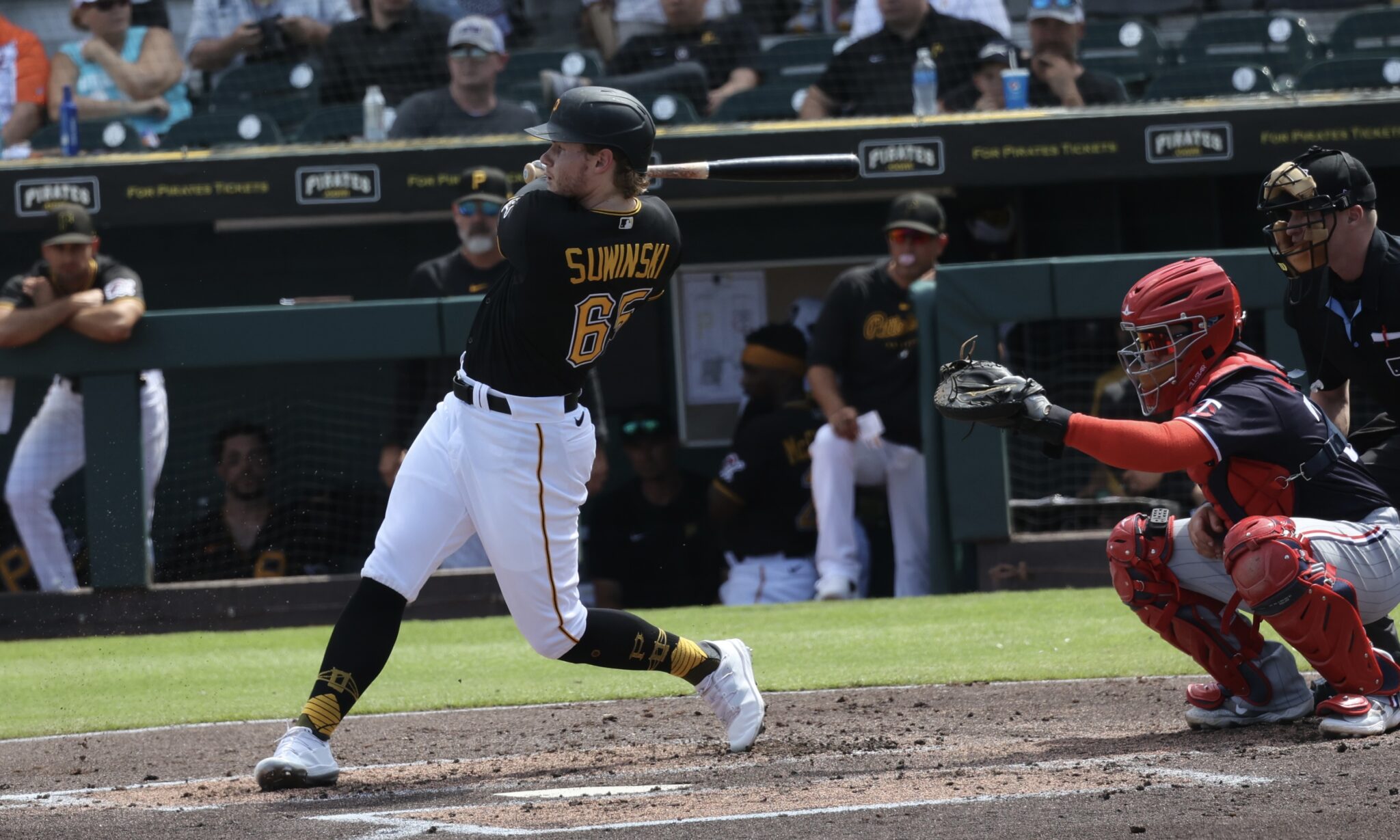 Jack Suwinski of the Pittsburgh Pirates high fives with JT